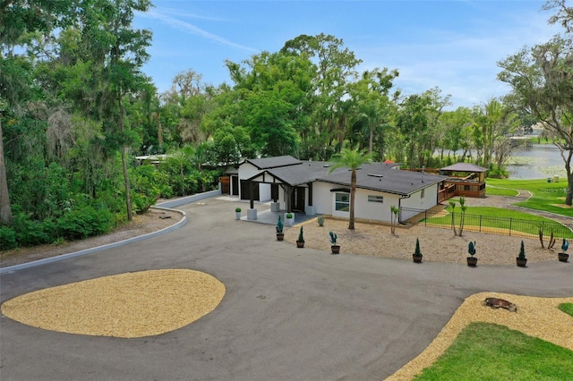 1700 Lake Markham Rd, Sanford, FL 32771 - view of home's community featuring asphalt driveway and a water view