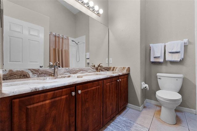 2729 Stanwood Dr, Kissimmee, FL 34743 - full bathroom with double vanity, tile patterned flooring, toilet, a shower with shower curtain, and baseboards