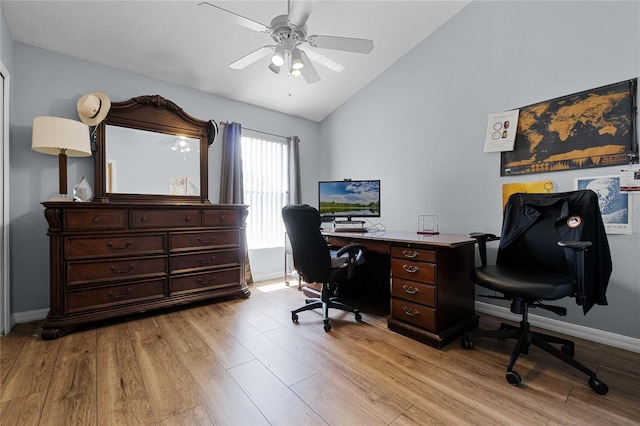 2729 Stanwood Dr, Kissimmee, FL 34743 - home office featuring vaulted ceiling, light wood-style floors, a ceiling fan, and baseboards