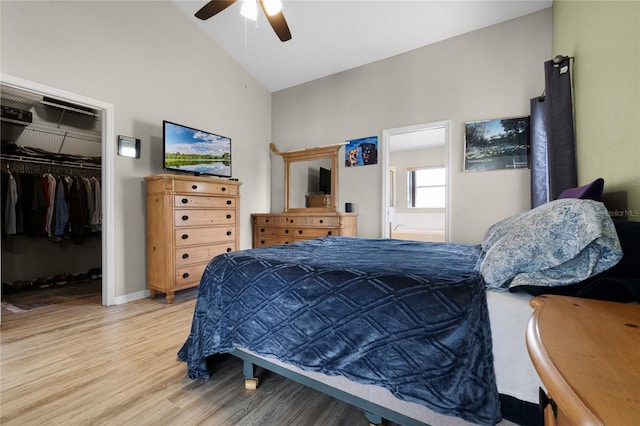2729 Stanwood Dr, Kissimmee, FL 34743 - bedroom with light wood-type flooring, a closet, a ceiling fan, lofted ceiling, and a spacious closet