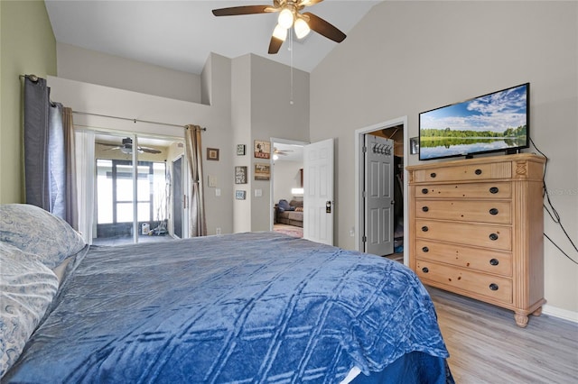 2729 Stanwood Dr, Kissimmee, FL 34743 - bedroom with light wood-style flooring, access to outside, ceiling fan, and high vaulted ceiling