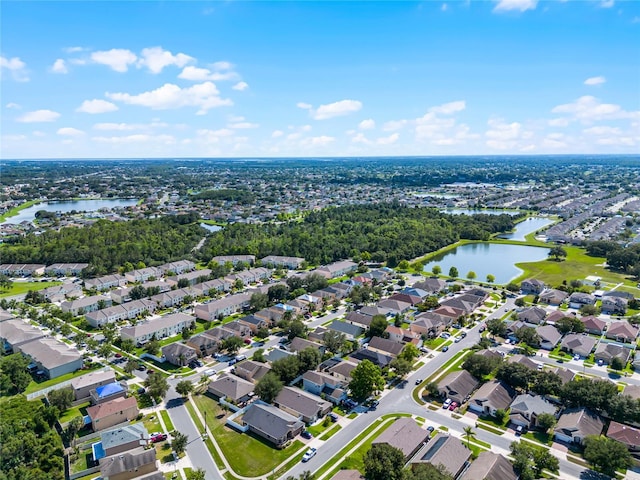 2729 Stanwood Dr, Kissimmee, FL 34743 - aerial overview of property's location featuring a nearby body of water and nearby suburban area