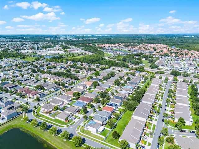 2729 Stanwood Dr, Kissimmee, FL 34743 - aerial overview of property's location with a large body of water and nearby suburban area