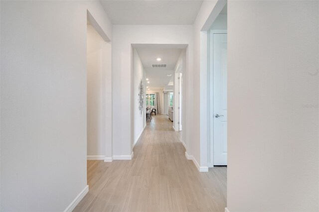 2479 Pine Preserve Ct, Saint Cloud, FL 34771 - corridor with baseboards and light wood-type flooring
