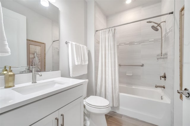 2479 Pine Preserve Ct, Saint Cloud, FL 34771 - bathroom with vanity, shower / bath combination with curtain, toilet, and wood finished floors