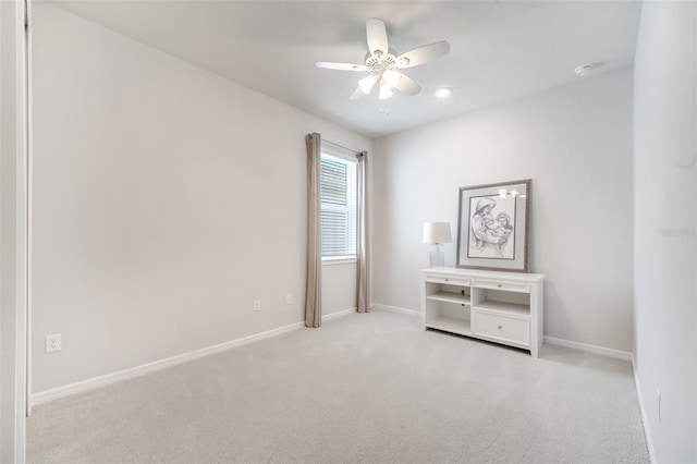 2479 Pine Preserve Ct, Saint Cloud, FL 34771 - spare room with carpet flooring, a ceiling fan, and baseboards