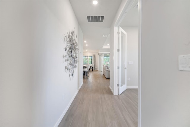 2479 Pine Preserve Ct, Saint Cloud, FL 34771 - hall featuring light wood finished floors, baseboards, and recessed lighting