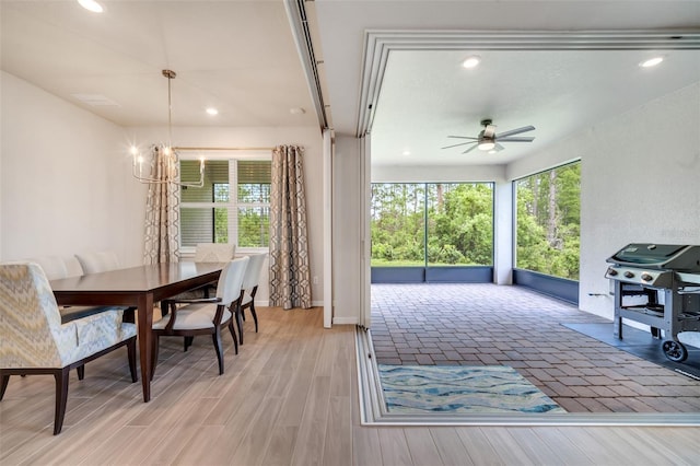 2479 Pine Preserve Ct, Saint Cloud, FL 34771 - dining space with a ceiling fan, a chandelier, recessed lighting, baseboards, and light wood-type flooring