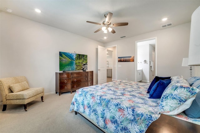 2479 Pine Preserve Ct, Saint Cloud, FL 34771 - bedroom featuring light colored carpet, baseboards, a ceiling fan, recessed lighting, and ensuite bathroom