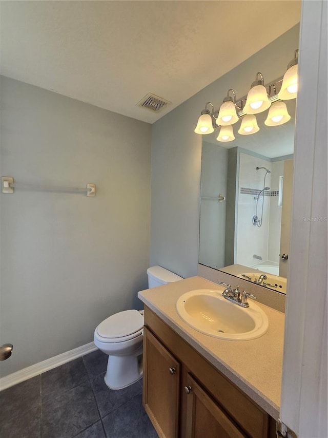 1754 Fritwell Ct, Ocoee, FL 34761 - bathroom featuring vanity, toilet, tile patterned flooring, a shower, and baseboards