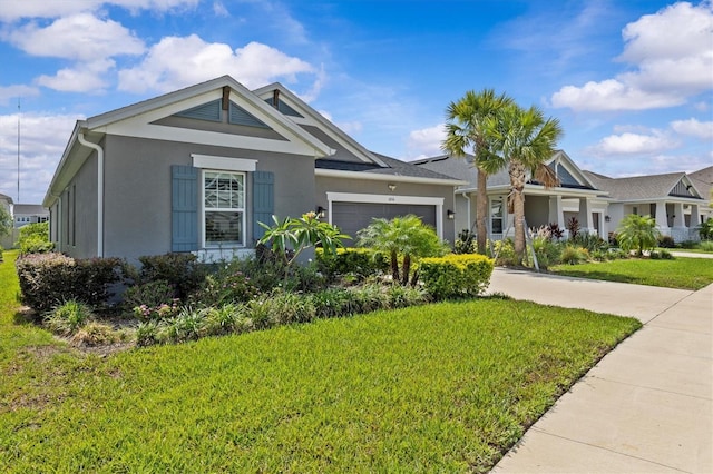 10516 Tranquil Meadow Loop, Riverview, FL 33569 - single story home with stucco siding, a front lawn, a garage, and driveway