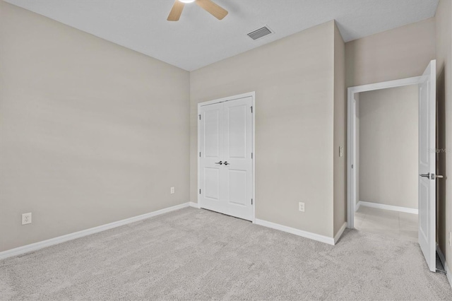 10516 Tranquil Meadow Loop, Riverview, FL 33569 - unfurnished bedroom with carpet floors, baseboards, and ceiling fan