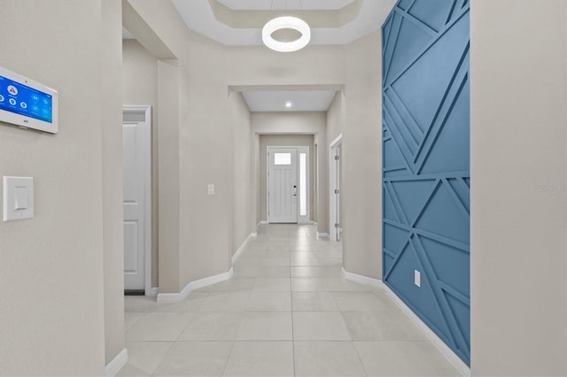 10516 Tranquil Meadow Loop, Riverview, FL 33569 - corridor featuring baseboards and light tile patterned floors