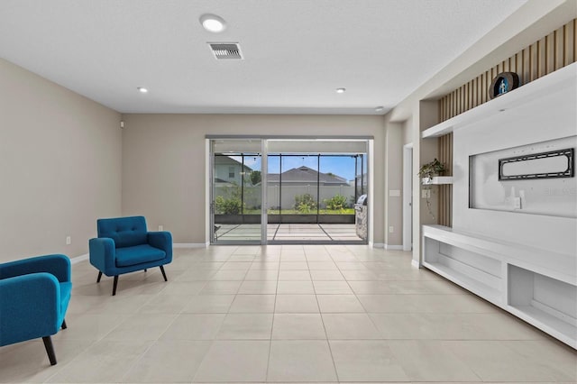 10516 Tranquil Meadow Loop, Riverview, FL 33569 - living area featuring baseboards, light tile patterned floors, and recessed lighting