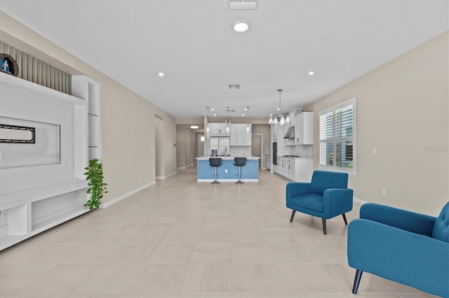 10516 Tranquil Meadow Loop, Riverview, FL 33569 - living room featuring recessed lighting, baseboards, and light tile patterned floors