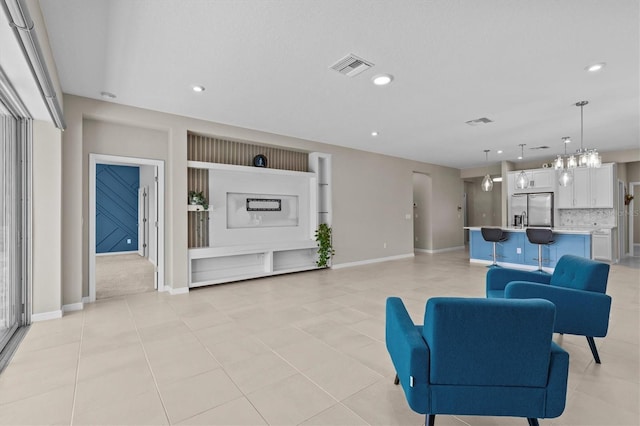 10516 Tranquil Meadow Loop, Riverview, FL 33569 - living room with recessed lighting, baseboards, and light tile patterned floors