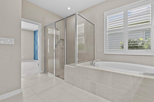 10516 Tranquil Meadow Loop, Riverview, FL 33569 - full bath with healthy amount of natural light, a garden tub, tile patterned floors, a shower stall, and recessed lighting