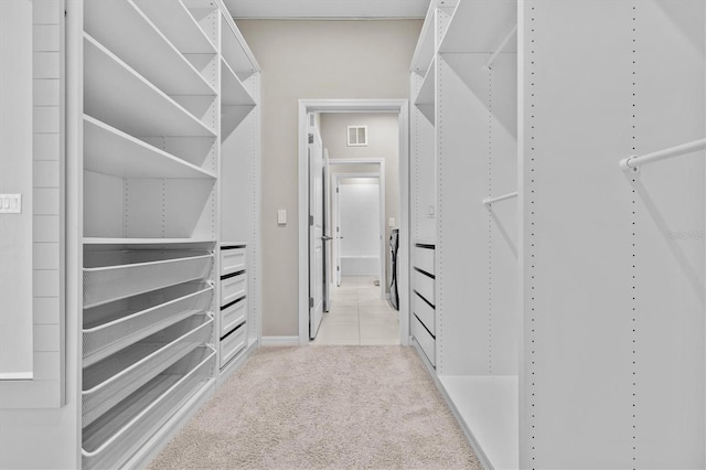 10516 Tranquil Meadow Loop, Riverview, FL 33569 - spacious closet featuring carpet flooring and tile patterned floors