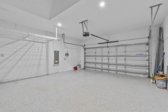 10516 Tranquil Meadow Loop, Riverview, FL 33569 - garage featuring electric panel and a garage door opener