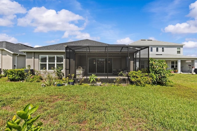 10516 Tranquil Meadow Loop, Riverview, FL 33569 - back of house with stucco siding, a yard, and glass enclosure