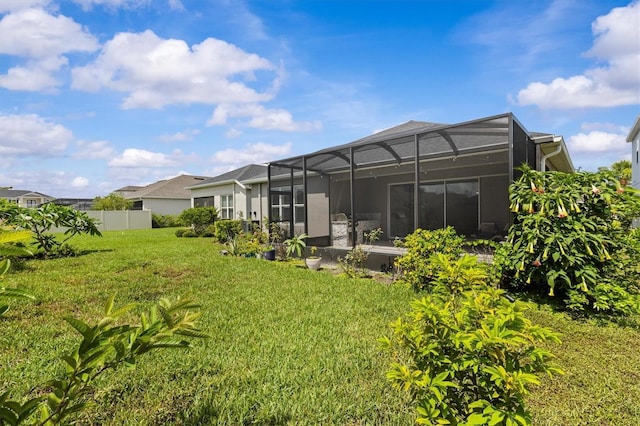 10516 Tranquil Meadow Loop, Riverview, FL 33569 - rear view of house with glass enclosure