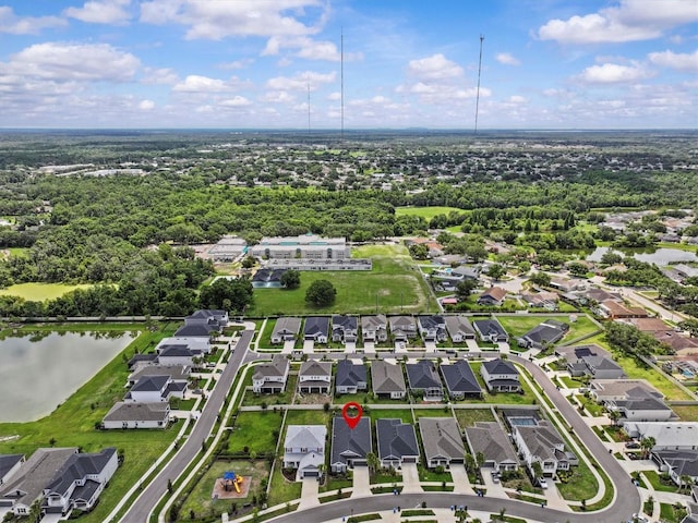 10516 Tranquil Meadow Loop, Riverview, FL 33569 - aerial overview of property's location with nearby suburban area and a large body of water