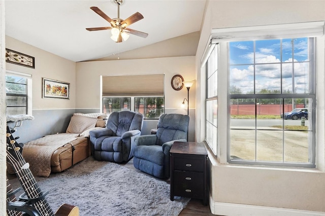 1111 Liberty Ave, Mount Dora, FL 32757 - living area featuring lofted ceiling, a ceiling fan, and wood finished floors