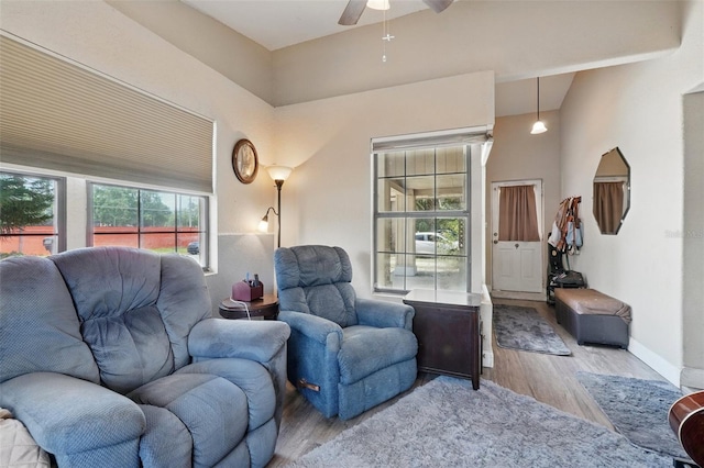 1111 Liberty Ave, Mount Dora, FL 32757 - living room featuring wood finished floors, ceiling fan, and baseboards