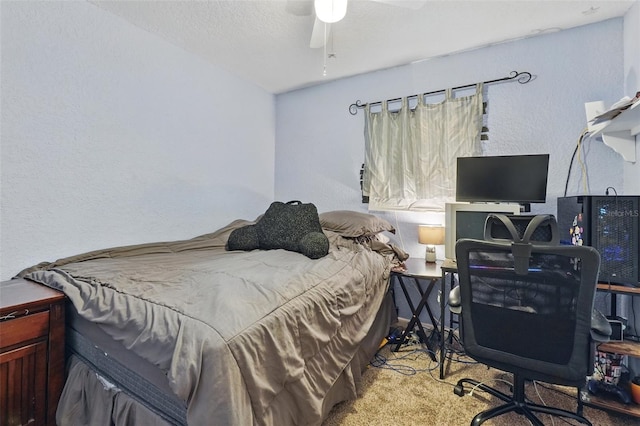 1111 Liberty Ave, Mount Dora, FL 32757 - bedroom with a textured wall, carpet floors, an office area, and a ceiling fan
