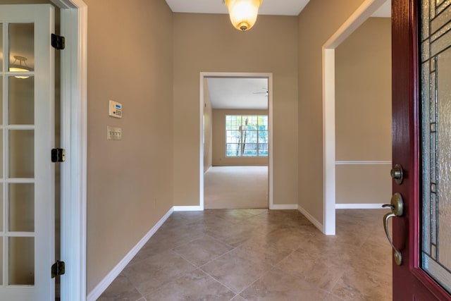 1947 Broadleaf Ct, Windermere, FL 34786 - entrance foyer featuring light tile patterned floors and baseboards