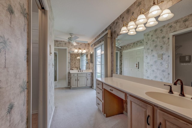 1947 Broadleaf Ct, Windermere, FL 34786 - bathroom featuring wallpapered walls, vanity, ceiling fan, and a closet