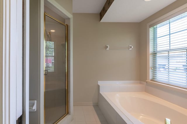 1947 Broadleaf Ct, Windermere, FL 34786 - bathroom with a stall shower, a bath, and plenty of natural light