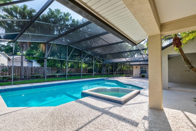 1947 Broadleaf Ct, Windermere, FL 34786 - view of swimming pool with a fenced backyard, a patio, a lanai, and a pool with connected hot tub