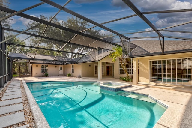 1947 Broadleaf Ct, Windermere, FL 34786 - view of swimming pool with a patio, a pool with connected hot tub, and a lanai