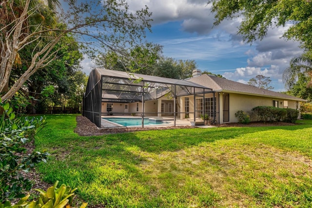 1947 Broadleaf Ct, Windermere, FL 34786 - back of property featuring a yard, an outdoor pool, and stucco siding