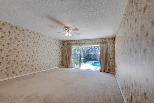 1947 Broadleaf Ct, Windermere, FL 34786 - carpeted empty room with wallpapered walls, ceiling fan, a textured ceiling, and baseboards