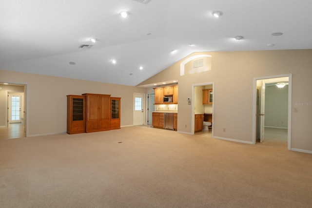 1947 Broadleaf Ct, Windermere, FL 34786 - unfurnished living room with baseboards, light colored carpet, and high vaulted ceiling