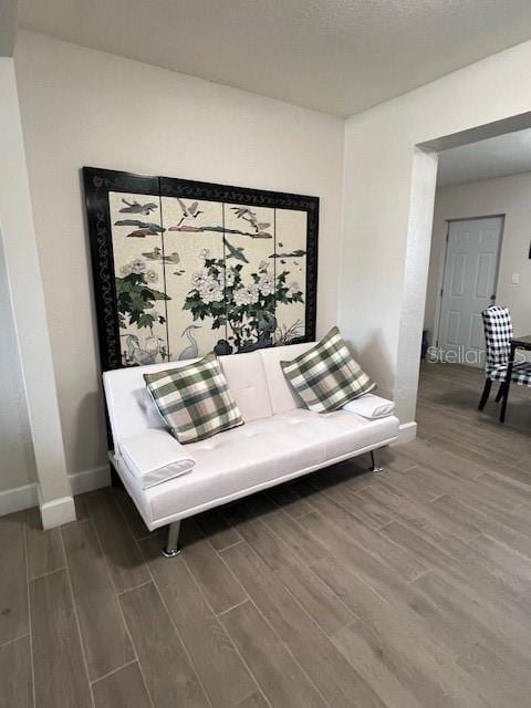 1620 Hialeah St, Orlando, FL 32808 - sitting room featuring wood finished floors and baseboards