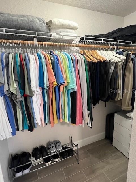 1620 Hialeah St, Orlando, FL 32808 - walk in closet with tile patterned floors