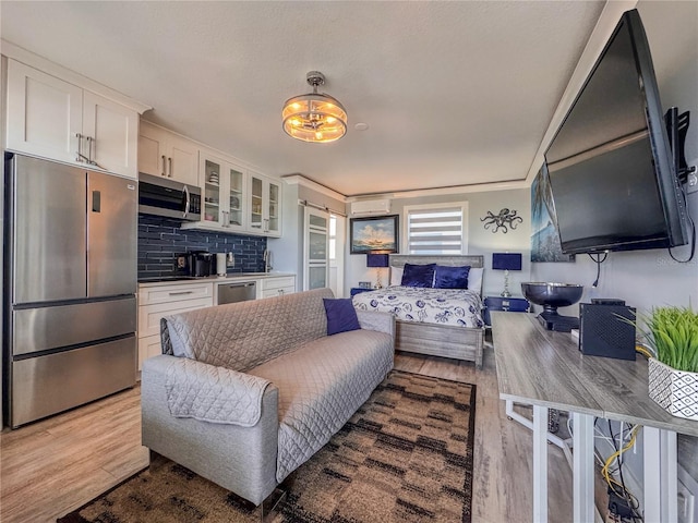 935 S Atlantic Ave Unit 244, Daytona Beach, FL 32118 - living room featuring light wood-style flooring