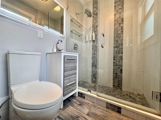 935 S Atlantic Ave Unit 244, Daytona Beach, FL 32118 - full bathroom with toilet, a stall shower, and vanity