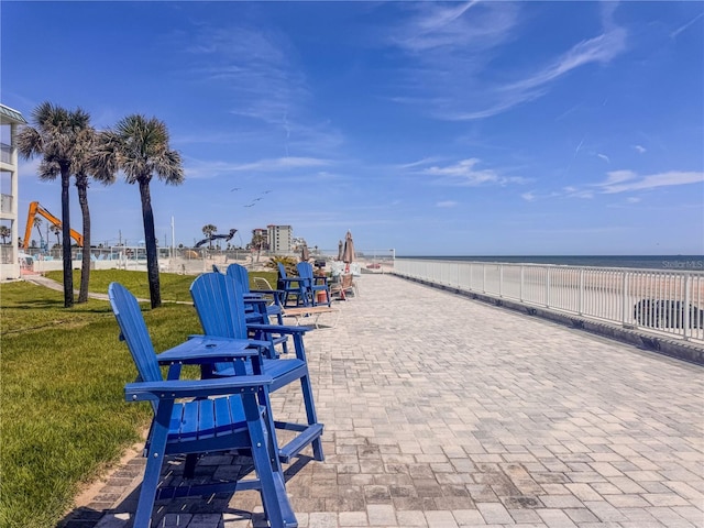 935 S Atlantic Ave Unit 244, Daytona Beach, FL 32118 - view of property's community with a yard and view of water and beach