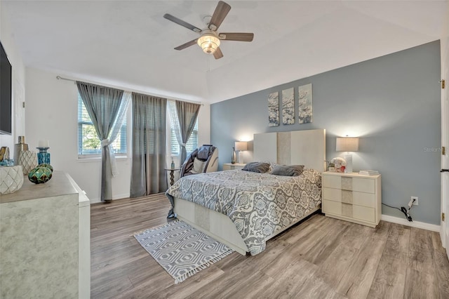 9455 Belmont Ter, Oviedo, FL 32765 - bedroom with wood finished floors, baseboards, and a ceiling fan