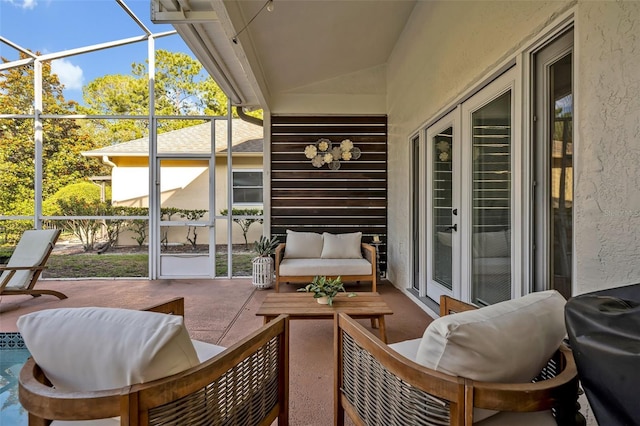 9455 Belmont Ter, Oviedo, FL 32765 - view of patio / terrace featuring a lanai and an outdoor hangout area