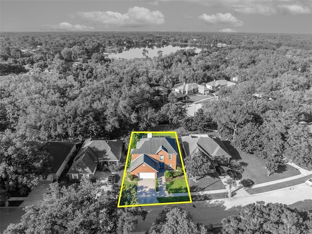 9455 Belmont Ter, Oviedo, FL 32765 - aerial view of residential area featuring a forest and property parcel outlined