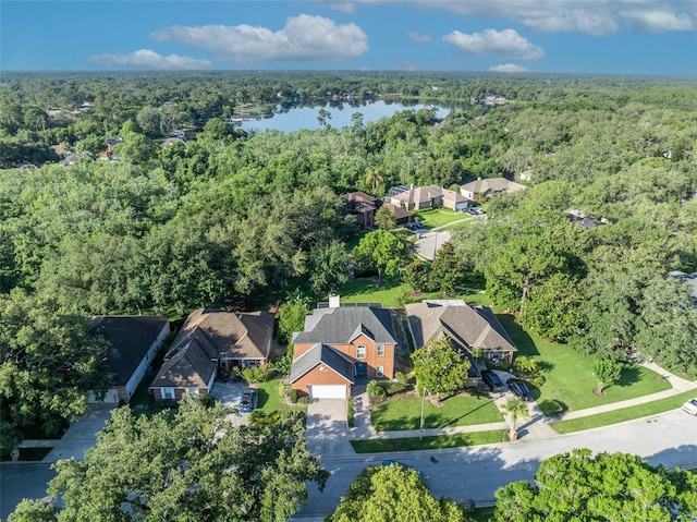 9455 Belmont Ter, Oviedo, FL 32765 - aerial view of property and surrounding area with a heavily wooded area, nearby suburban area, and a large body of water