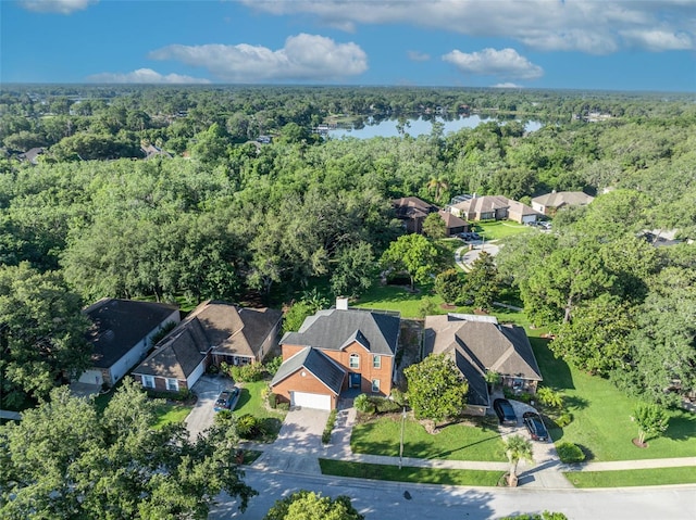 9455 Belmont Ter, Oviedo, FL 32765 - aerial overview of property's location with a forest, nearby suburban area, and a nearby body of water