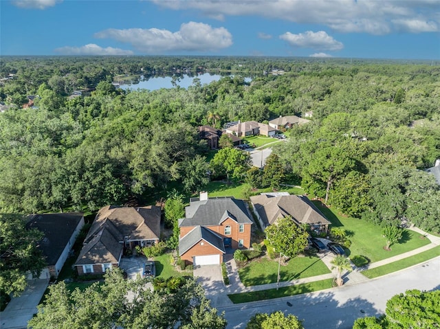 9455 Belmont Ter, Oviedo, FL 32765 - aerial overview of property's location featuring a forest, nearby suburban area, and a nearby body of water