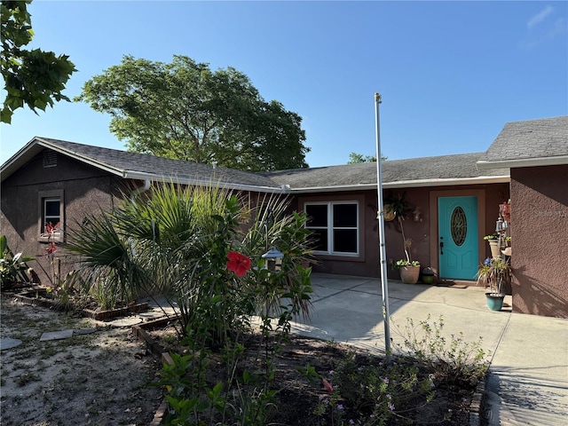 11314 Huggins St, Leesburg, FL 34788 - single story home with a patio area and stucco siding