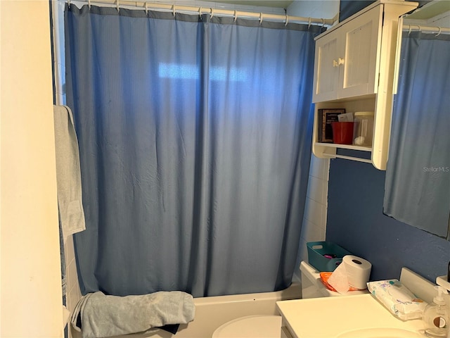11314 Huggins St, Leesburg, FL 34788 - bathroom featuring toilet, vanity, and shower / bath combo